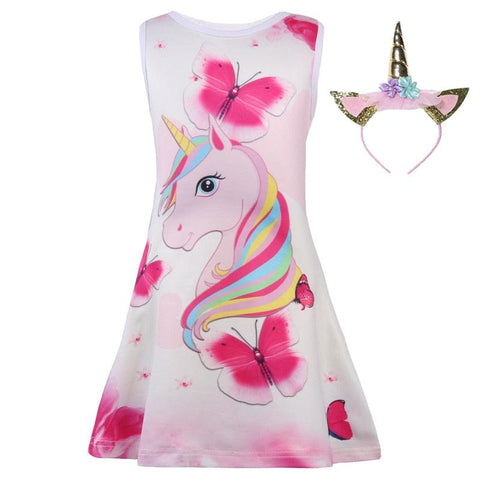 Image representant une robe licorne pour enfant et le modele a